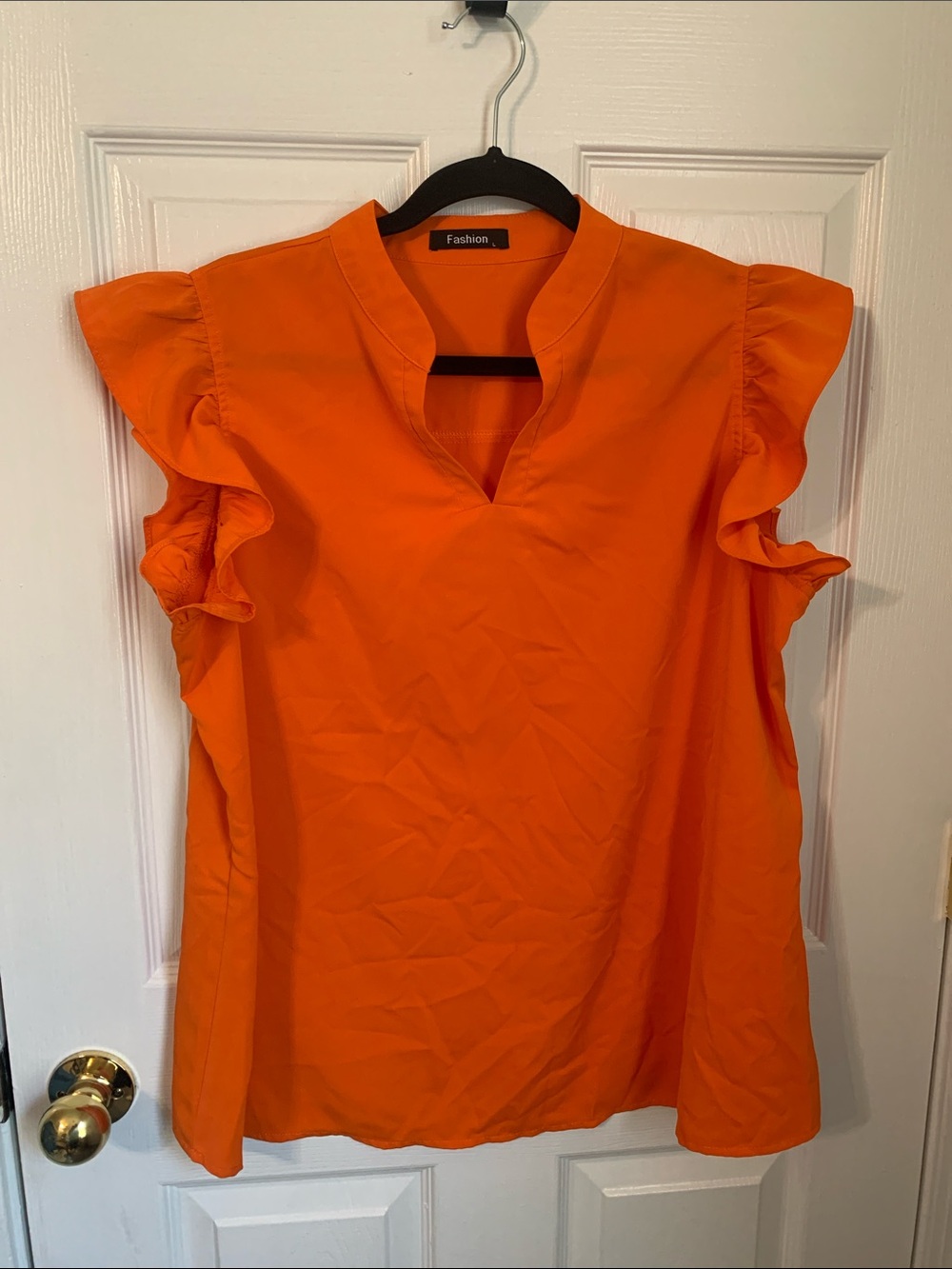 Orange Large flutter sleeve blouse